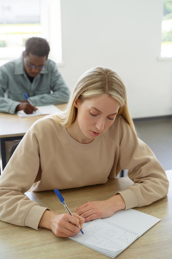 high-angle-people-studying-classroom.jpg